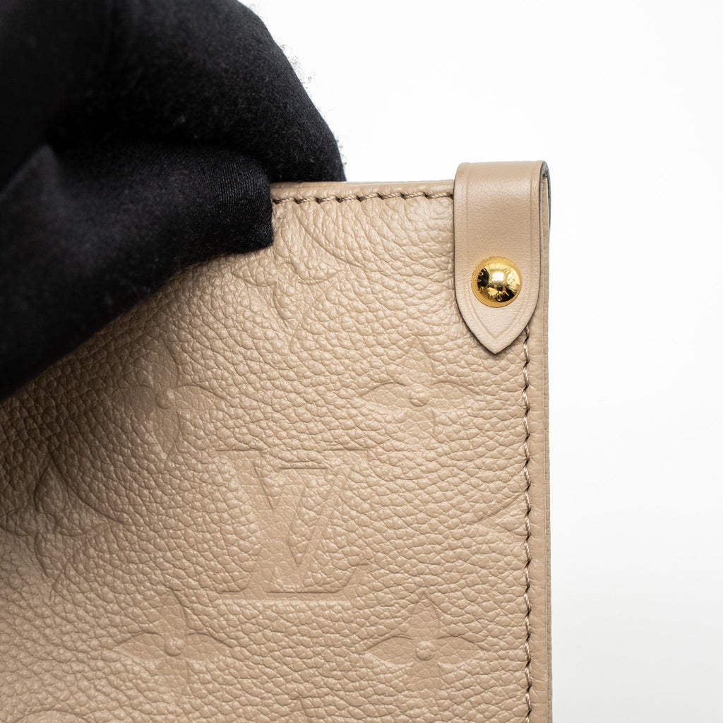 Onthego MM Tourterelle Monogram Empreinte Leather Tote Bag Gold-Tone Hardware