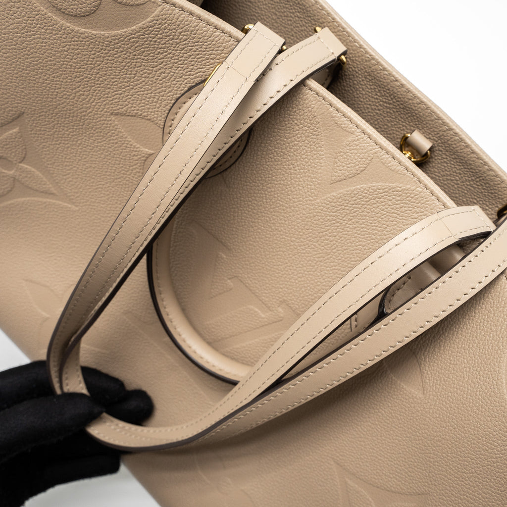 Onthego MM Tourterelle Monogram Empreinte Leather Tote Bag Gold-Tone Hardware